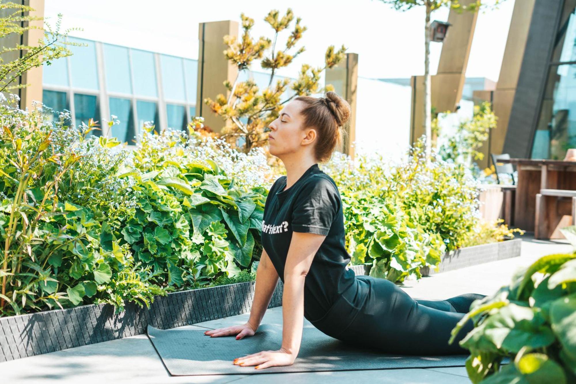 Next House Copenhagen Hostel Exterior photo Yoga at the rooftop garden of the hotel